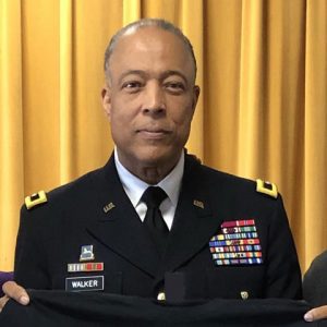 Major General Walker, in between Principal Rawls and President McGrath during an appearance at Leo in 2018
